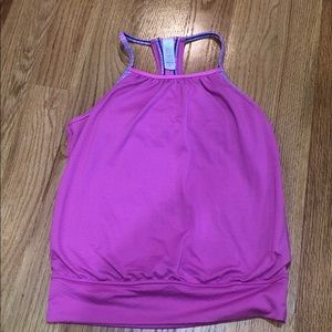 Pink Ivivva tank top. Never worn. Built in Bra